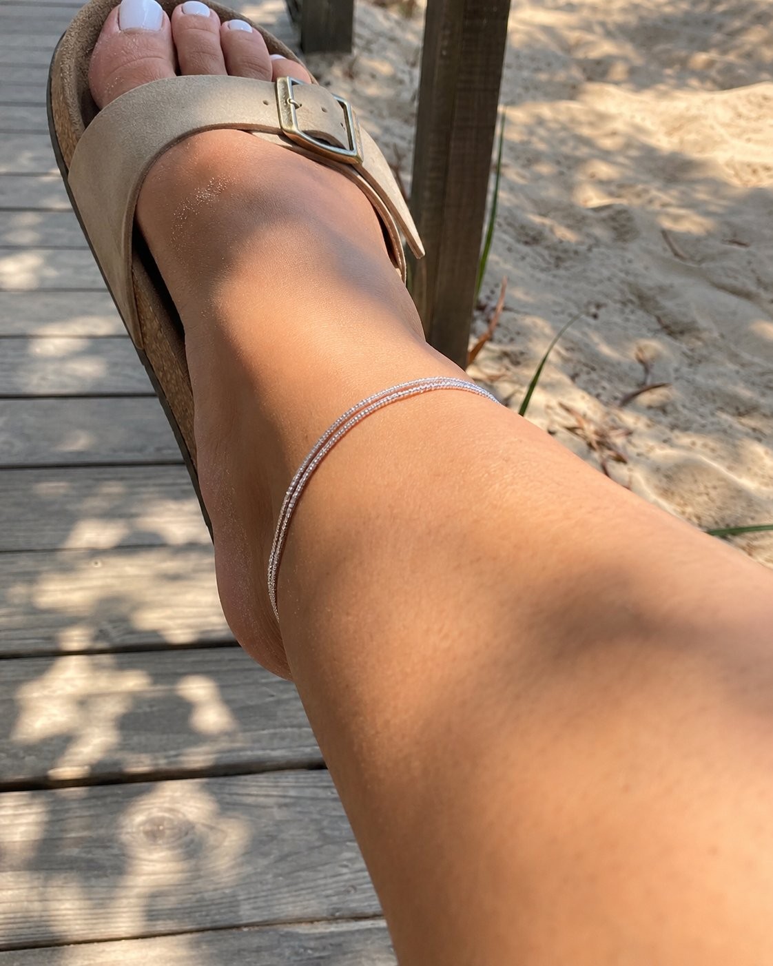 AMORA anklet shown on a fuller ankle, sitting comfortably